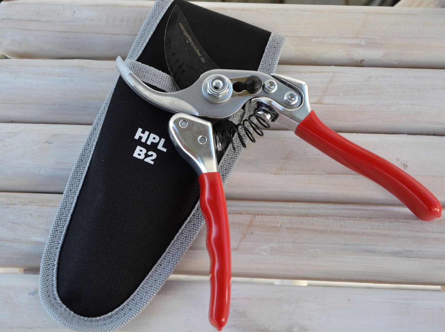 HPL Gartenschere Bypass B2 Profischere für Holz und Stauden bis 28 mm + praktische Gürteltasche 5 HPL Gartenschere Bypass B2 Profischere für Holz und Stauden bis 28 mm + praktische Gürteltasche – Bild 5